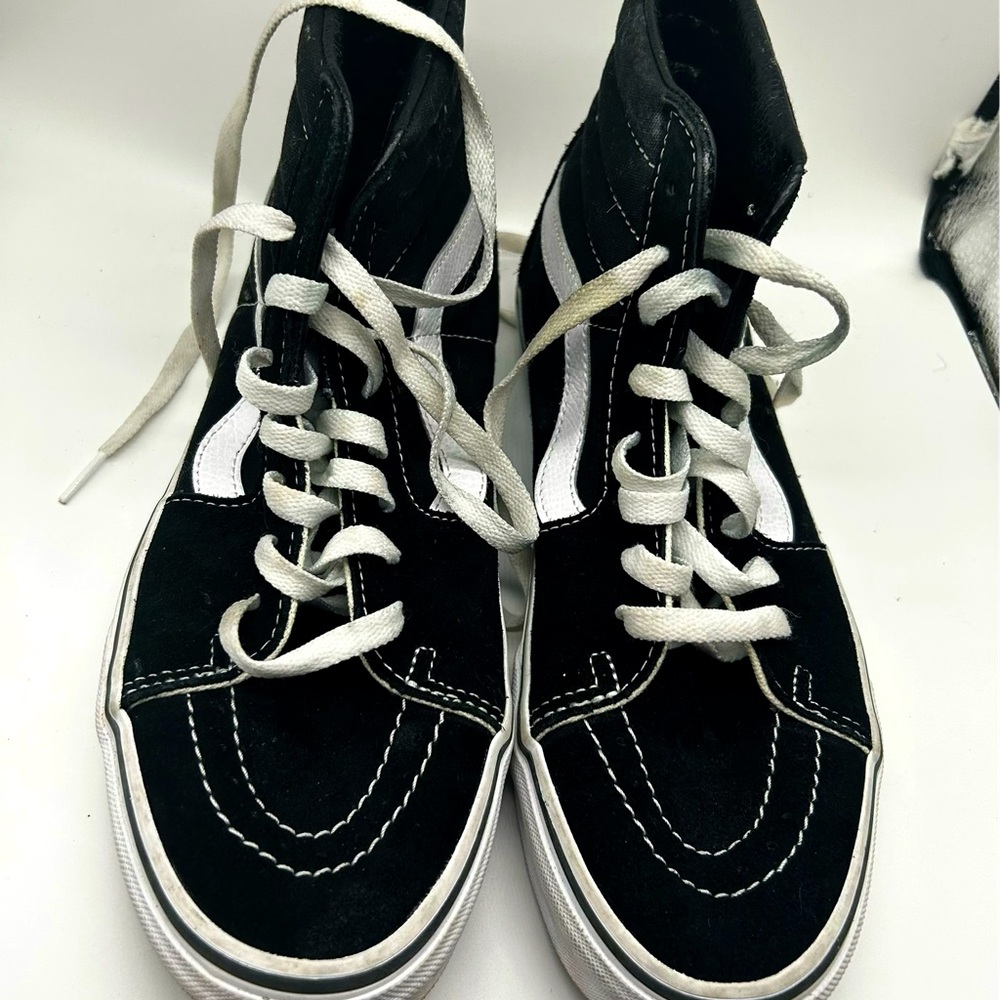Black and White Vans sneakers